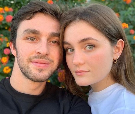 The American actress Grace Victoria Cox shares a picture with a guy named Jake Seif.