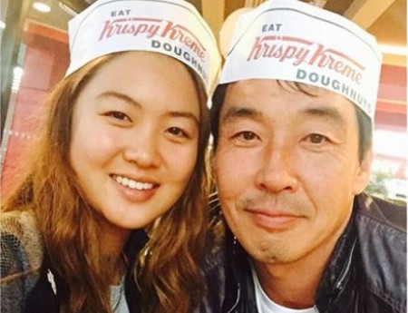 Minjee Lee and her dad.