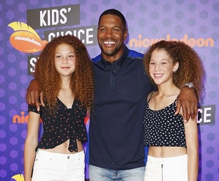 The celebrity daughter Sophia Strahan (right) with her twin sister Isabella Strahan and father Michael Strahan.