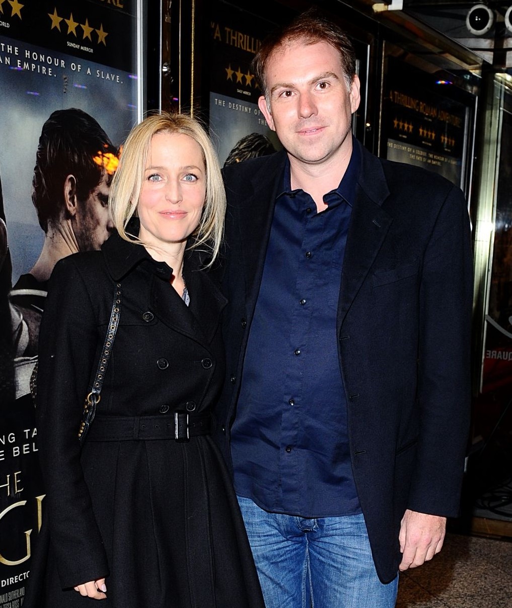Clyde Klotz with his beautiful ex-wife Gillian Anderson, attending an event show.