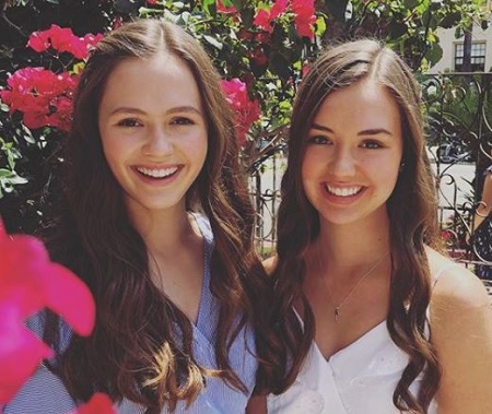 Olivia Sanabia(left) with her older sister Savannah Sanabia(singer).
