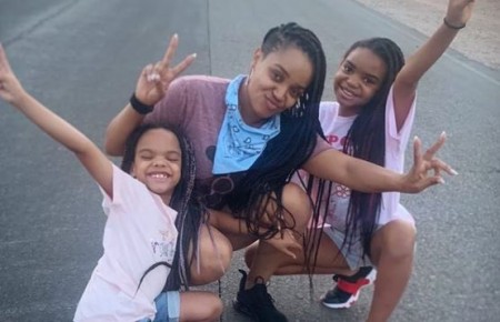 Kyla with her daughters, Liyah and Lyric.