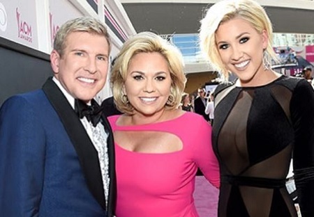 Todd Chrisley with his second wife, Julie Chrisley (middle), and daughter, Savannah Chrisley (right).