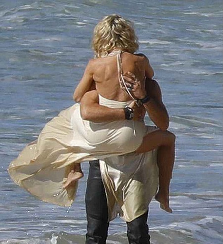  Marco Pigossi and Elsa Pataky's Kissing Eachother In The TV Screen, Tideland