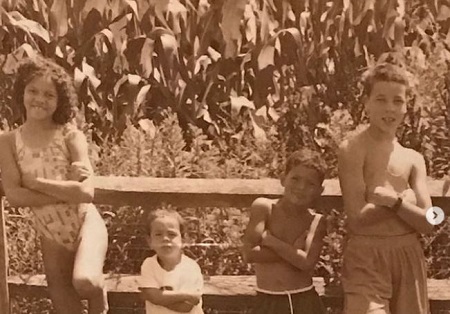 The childhood image of Callie Rivers (left) with her brothers Jeremiah (right), Austin (second from right), and Spencer Rivers (second from left).