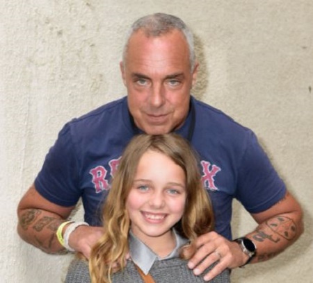 Titus Welliver shared a daughter Cora McBride Walling Welliver with his fourth wife Elizabeth W. Alexander.