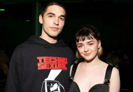 Maisie Williams and Reuben Selby attended 'Christopher Kane' fashion show during London Fashion Week
