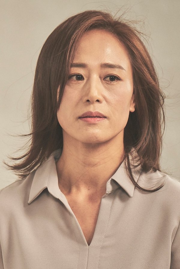 Portrait photo of Woo Mi-hwa wearing shirt