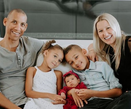 The former NBA player, Reggie Miller, with his love partner, Laura Laskowski, and three adorable babies.
