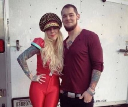 The wrestler Baron Corbin was in a relationship with This Moment's lead singer Maria Brink.