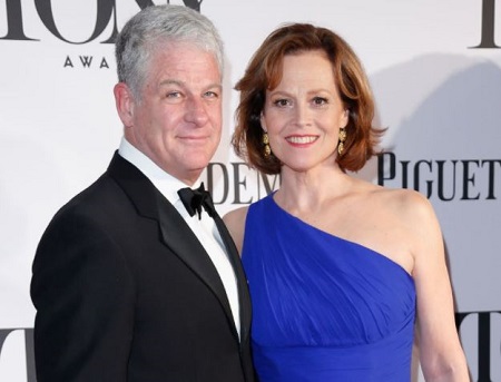 Jim Simpson and Sigourney Weaver attended The 67th Annual Tony Awards at Radio City Music Hall on June 9, 2013, in New York City