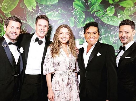 The American soprano, Sarah Joy Miller with her husband, David Miller (second from left), and other II Divo's members, Carlos Marin (second from right), Urs Buhler (right), and Sebastien Izambard (left)