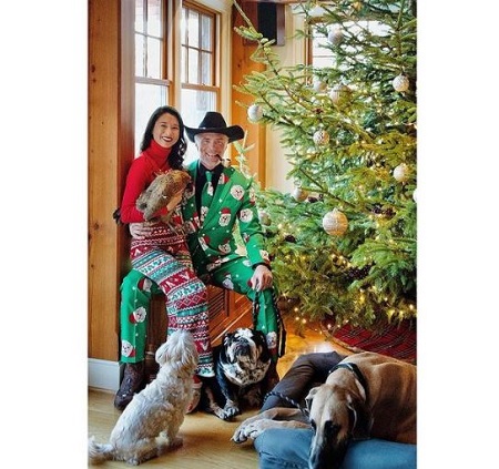 Darah Trang and Anson Mount with their pet dogs Jax, Nova, Betty Lou, and hen.