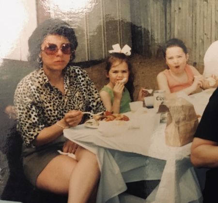 Lauren Maloney with her mother and sister when she was a toddler. How much is Maloney's net worth?
