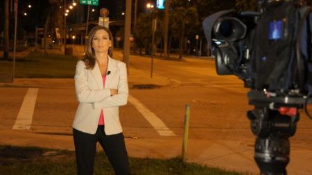 BTS scene of Janine reporting the news at WPLG Local 10 News 
