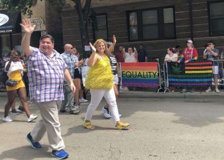 The Pritzker couple supporting at LGBTQ march.
