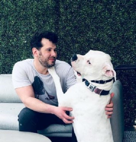 Hilary Crowder's Husband, Steven Crowder' Holding Their Pet Dog Named Joe Louis