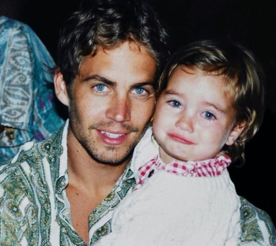 The childhood image of Meadow Rain Walker with her father late. Paul Walker.