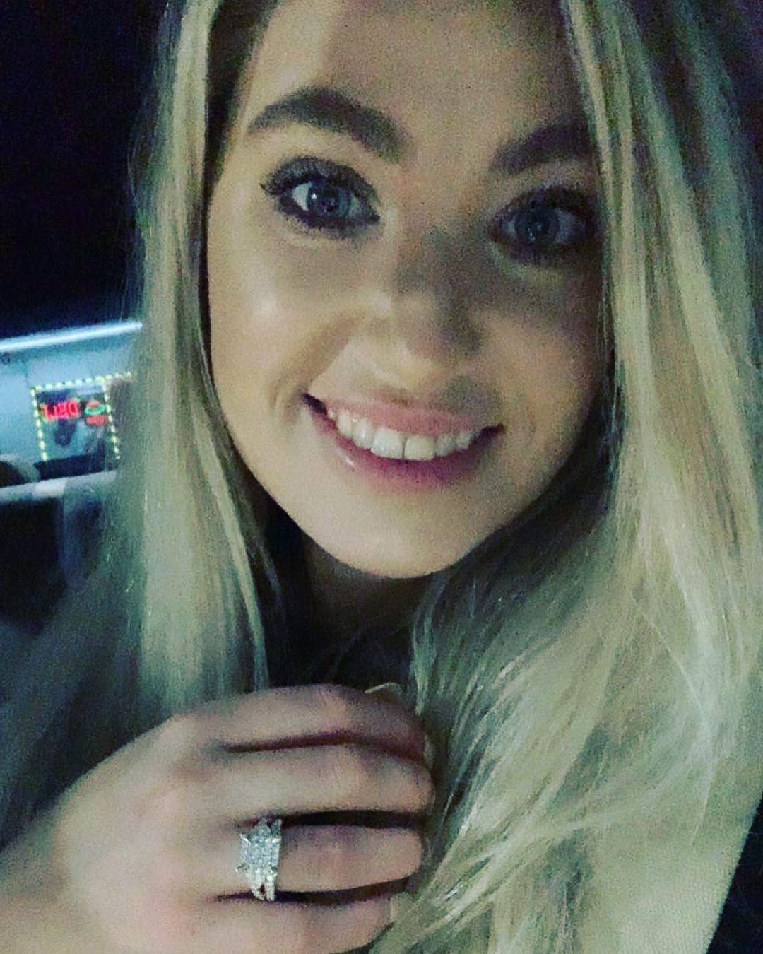 Kyle Chrisley's Wife, Nelson showing off her engagement ring.