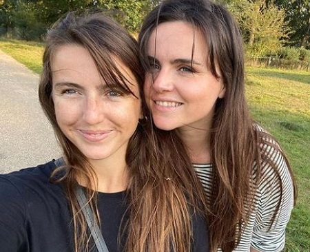 Vivi Kenny (left) is the sister of British actress, screenwriter, Emer Kenny (right).
