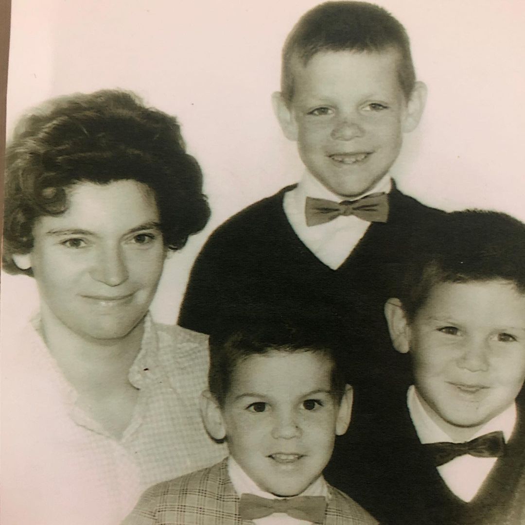 Garth Kemp with his mom and brothers.