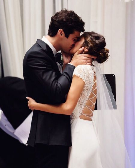 Esther Kim and her husband, Matthew Daddario kissing each other at their wedding day. See all the things related to the couple's wedding!