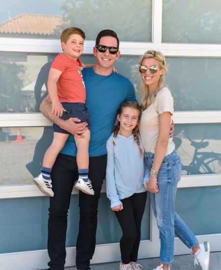 Tarek El Moussa with his two children, Taylor El Moussa, Brayden El Moussa; and his fiancee, Heather Rae Young. See all the details about El Moussa's earnings and net worth in 2021!