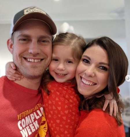 Emily Spain with her spouse Travis Ross and daughter Catie Ross.
