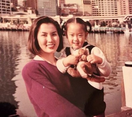 The childhood image of Michelle Wie with her mother Boo Wei.