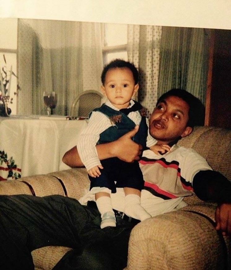 Makkon Tesfaye holding The Weeknd as a toddler.