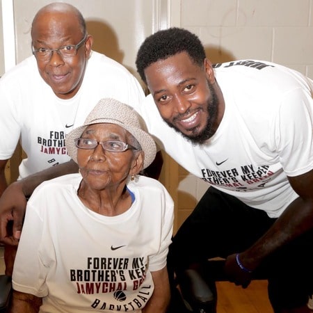 Kemeche I. Green's father Alonzo Green, brother JaMychal Green and her late grandmother 