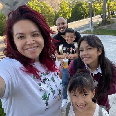 Jacquie Campos is taking the selfie as Jaylah, Jordan, Jenavieve, and Mike Campos are smiling at the camera.