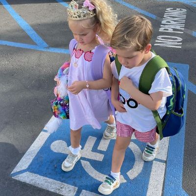Haven Mae Herjavec is dressed as a princess as she is walking together with her brother Hudson Robert Herjavec
