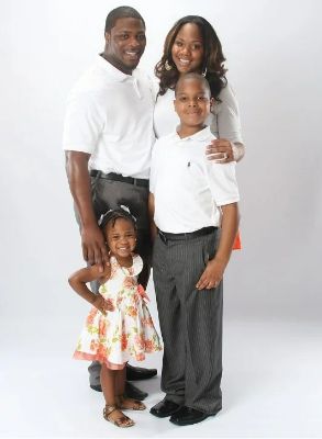 Mackenzie Henson with her parents and older brother Malachai Jakes in 2011..