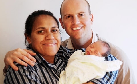 Jamie Murch, Cathy Freeman and their daughter Susie Anne posing for photoshoot