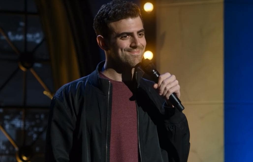 Sam Morril on his mike.