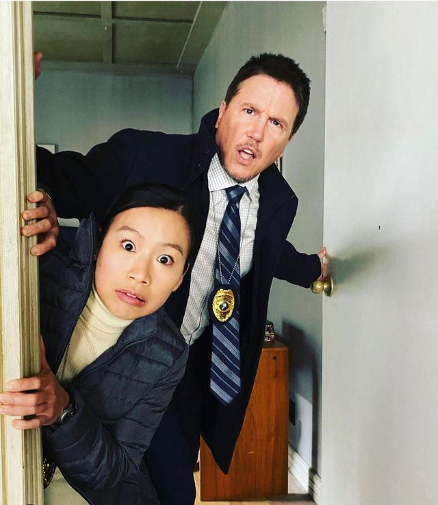 Lochlyn Munro and his partner in crime Annie Chang was captured making funny facial attires and staring from the door