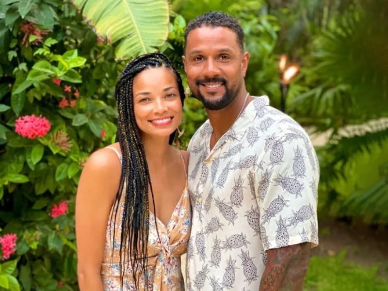 Rochelle Aytes posing for a photo with her husband C.j Lindsey