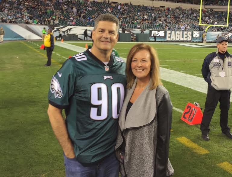 Christine Golic with her husband Mike Golic in a smiley face