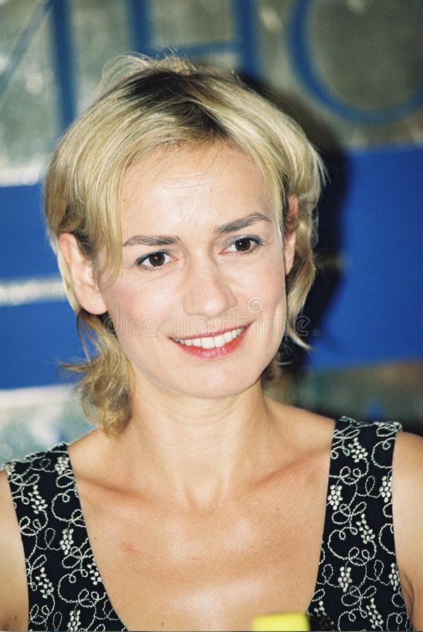 Sandrine Bonnaire was captured in a short dark grey hair and in a smiley face
