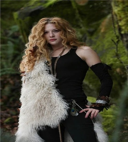 Picture of Rachelle Lefevre posing for a photoshoot wearing black color dress
