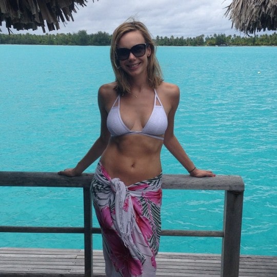  Picture of Amanda Walsh posing for a photoshoot wearing bikini