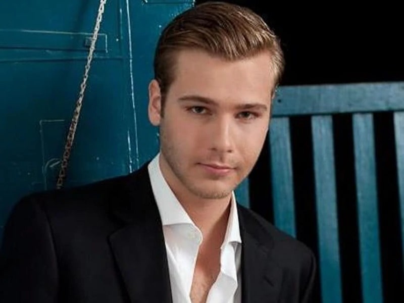 Anthony Ingruber was captured in a wearing black coat and whit shirt