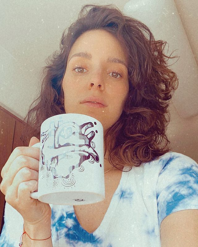 Carla Baritta was captured with the cup she designed to drink coffee