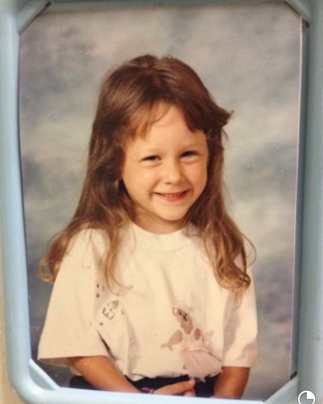 Childhood picture of Erin Coscarelli posing for a photoshoot wearing white color t shirt