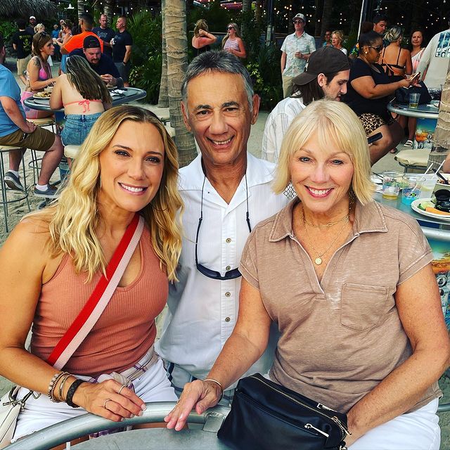 Amber Theoharis with her father Kris Theoharis and mother Denny Theoharis