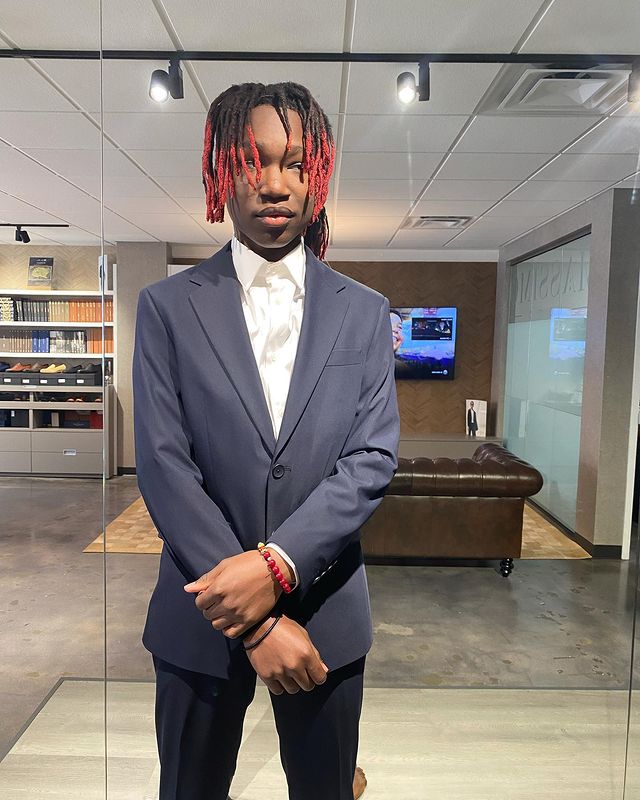 Picture of YNW BSlime wearing blue color formal dress