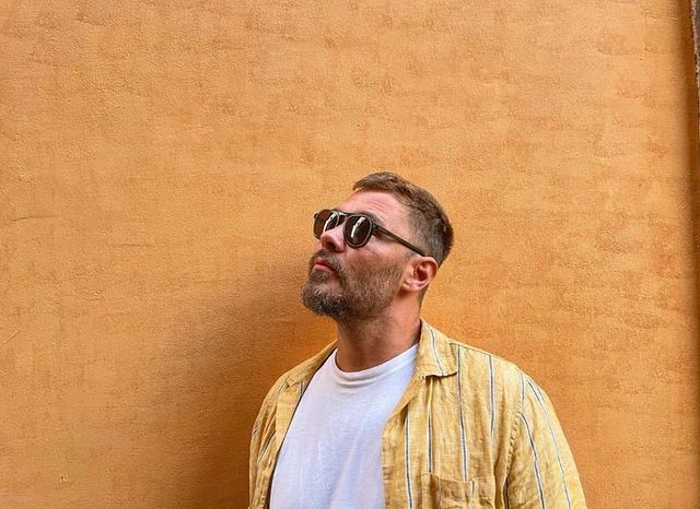 Picture of Patrick Flueger wearing sunglasses