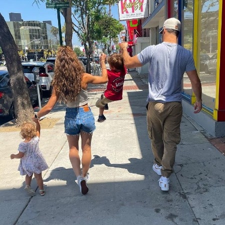 Chrysti Ane and Ryan Guzman with their children going on a vacation
