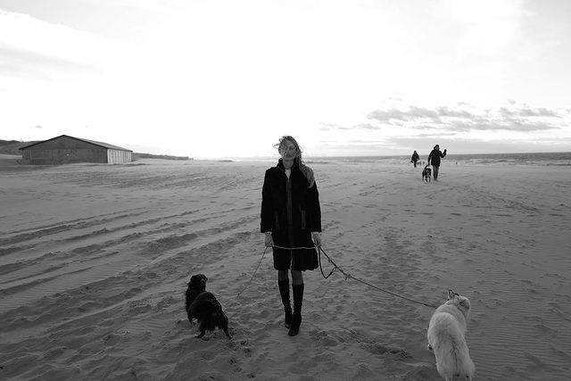 Picture of one girl and two dogs taken by Leica